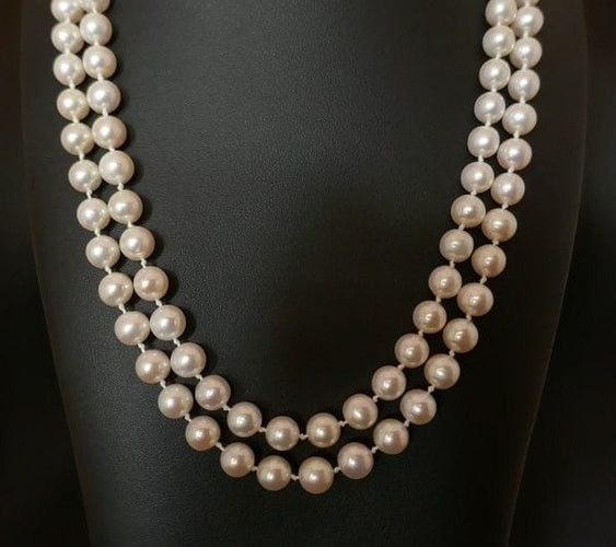 Collier Sautoir de perles de culture avec fermoir en or jaune 18 carats 58 Facettes 1008824