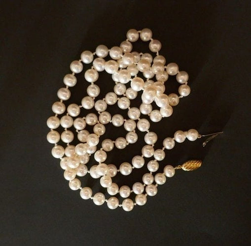 Collier Sautoir de perles de culture avec fermoir en or jaune 18 carats 58 Facettes 1008824