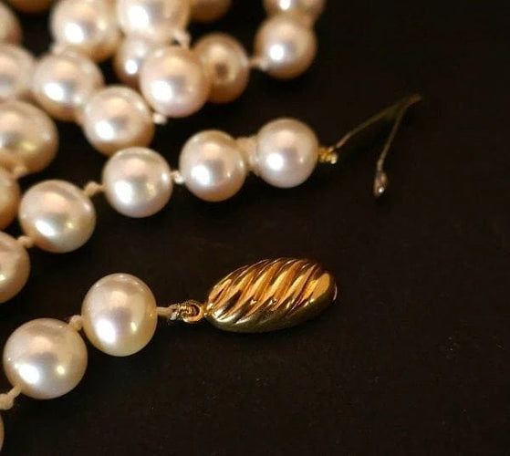 Collier Sautoir de perles de culture avec fermoir en or jaune 18 carats 58 Facettes 1008824