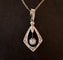 Pendentif Art déco - Pendentif en platine et or blanc 18 carats à diamants 58 Facettes 960722