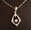 Pendentif Art déco - Pendentif en platine et or blanc 18 carats à diamants 58 Facettes 960722