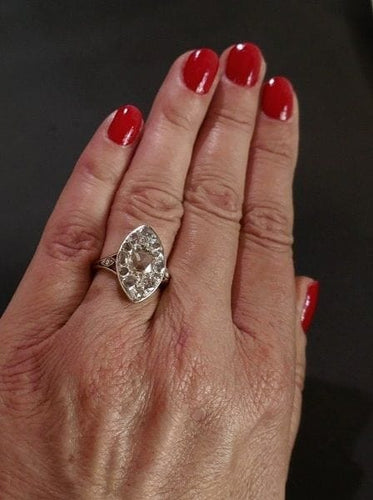 Bague 56 Bague marquise sertie de diamants en or jaune 18 carats et platine 58 Facettes 957825