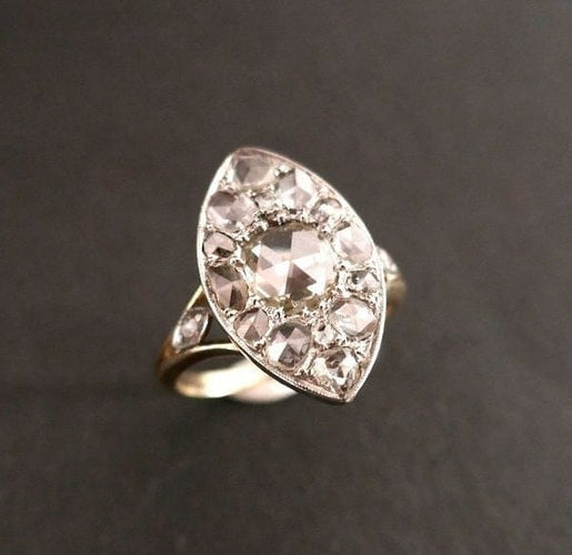 Bague 56 Bague marquise sertie de diamants en or jaune 18 carats et platine 58 Facettes 957825