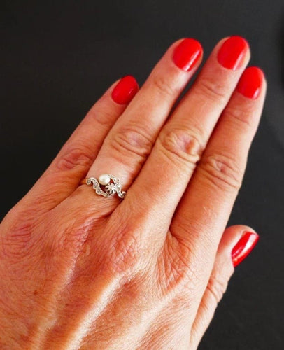 Bague 55 Bague en or jaune 18 carats avec perle et diamants 58 Facettes