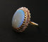 Bague 49 Bague fleur opale cabochon et diamants en or jaune 18 carats 58 Facettes