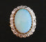 Bague 49 Bague fleur opale cabochon et diamants en or jaune 18 carats 58 Facettes
