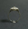 Bague 54 Bague fleur Art déco en or blanc 18 carats et platine, diamants 58 Facettes 1084362