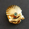Broche Cartier - Boutonnière coquille Saint-Jacques en or jaune 18 carats et émeraude 58 Facettes