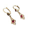Boucles d'oreilles Boucles d’oreilles dormeuses en or 18 carats bicolore et pierres rouges 58 Facettes