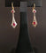 Boucles d'oreilles Boucles d’oreilles dormeuses en or 18 carats bicolore et pierres rouges 58 Facettes