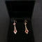 Boucles d'oreilles Boucles d’oreilles dormeuses en or 18 carats bicolore et pierres rouges 58 Facettes