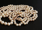 Collier Collier 3 rangs de perles de culture avec fermoir en or jaune 18 carats 58 Facettes