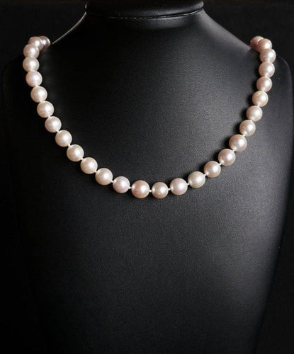 Collier Collier choker de perles de culture crème, fermoir en or jaune 18 carats 58 Facettes