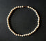 Collier Collier choker de perles de culture crème, fermoir en or jaune 18 carats 58 Facettes
