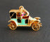 Pendentif Pendentif breloque voiture émaillée en or jaune 18 carats 58 Facettes