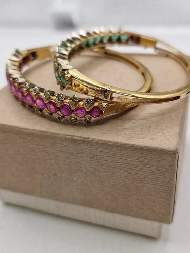 Bracelet Bracelets jonc vintage en or 18 carats, rubis, émeraudes et diamants 58 Facettes