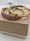 Bracelet Bracelets jonc vintage en or 18 carats, rubis, émeraudes et diamants 58 Facettes