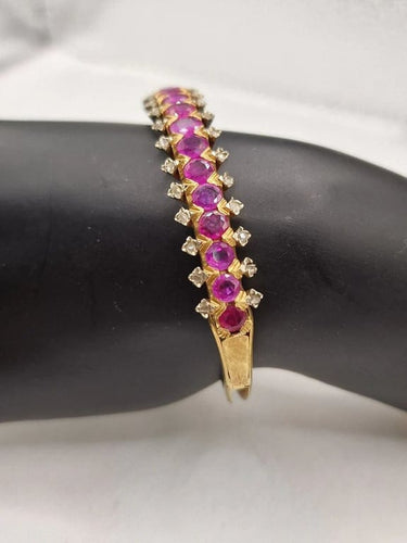 Bracelet Bracelets jonc vintage en or 18 carats, rubis, émeraudes et diamants 58 Facettes