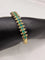 Bracelet Bracelets jonc vintage en or 18 carats, rubis, émeraudes et diamants 58 Facettes