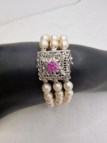 Bracelet Bracelet vintage en perles et rubis avec fermoir en or blanc 18 carats 58 Facettes