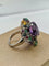 Bague 54 Bague Tutti I Frutti en or blanc, améthyste et diamants 58 Facettes