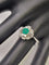 Bague 54 Bague vintage en or blanc 18 carats, émeraude et diamants 58 Facettes