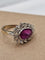 Bague 57 Bague en or blanc 18 carats avec rubis ovale et diamants 58 Facettes