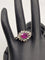 Bague 57 Bague en or blanc 18 carats avec rubis ovale et diamants 58 Facettes