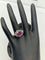 Bague 57 Bague en or blanc 18 carats avec rubis ovale et diamants 58 Facettes