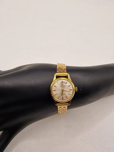 Montre Omega Genève - Montre vintage en or jaune 18 carats 58 Facettes