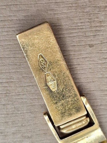 Montre Omega Genève - Montre vintage en or jaune 18 carats 58 Facettes