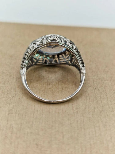 Bague 52 Bague ancienne en or blanc 18 carats et aigue-marine 58 Facettes