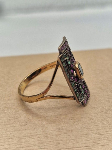 Bague 61 Bague ancienne en or jaune 18 carats avec aigue-marine, rubis et émeraudes 58 Facettes