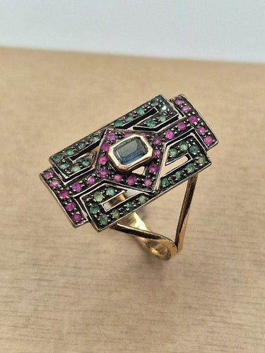 Bague 61 Bague ancienne en or jaune 18 carats avec aigue-marine, rubis et émeraudes 58 Facettes