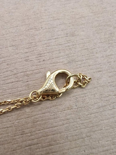 Pendentif Cartier - Pendentif amulette en or jaune 18 carats, nacre et diamant 58 Facettes