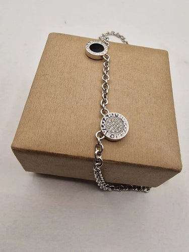 Collier Bvlgari Bvlgari - Collier double face en or blanc 18k, diamants et onyx 58 Facettes