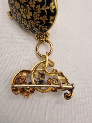 Montre Baume & Mercier - Broche montre en or jaune 18 carats et émail 58 Facettes