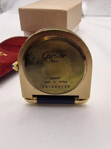 Montre Cartier - Pendulette de table en laiton plaqué et émail 58 Facettes