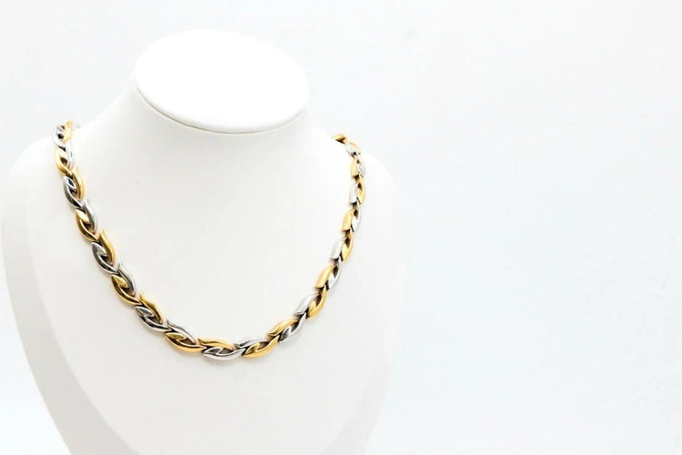 Collier Collier motif feuilles entrelacées en or blanc et jaune 750 58 Facettes 240004