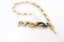 Collier Collier motif feuilles entrelacées en or blanc et jaune 750 58 Facettes 240004