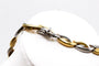 Collier Collier motif feuilles entrelacées en or blanc et jaune 750 58 Facettes 240004