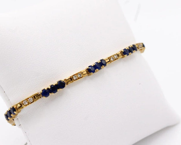 Bracelet Bracelet rivière en or jaune 18 ct, diamants et saphirs 58 Facettes 240045