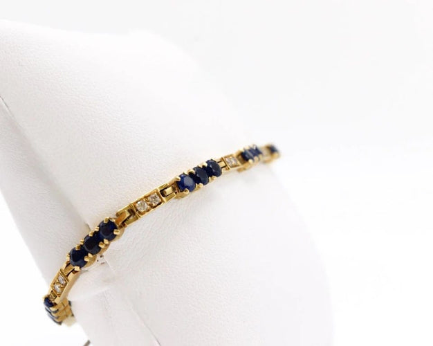 Bracelet Bracelet rivière en or jaune 18 ct, diamants et saphirs 58 Facettes 240045