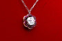 Collier Collier marguerite en or jaune, platine, diamant et rubis 58 Facettes 240285