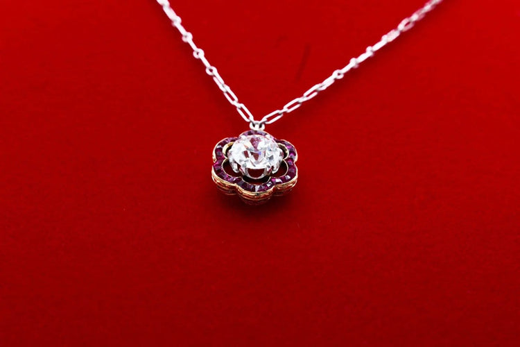 Collier Collier marguerite en or jaune, platine, diamant et rubis 58 Facettes 240285