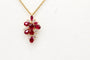 Pendentif Pendentif en or jaune 750 avec rubis et diamants 58 Facettes 250293