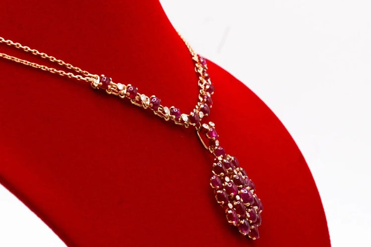 Collier Collier - Cabochons de rubis et diamants en or jaune 750 58 Facettes 240040