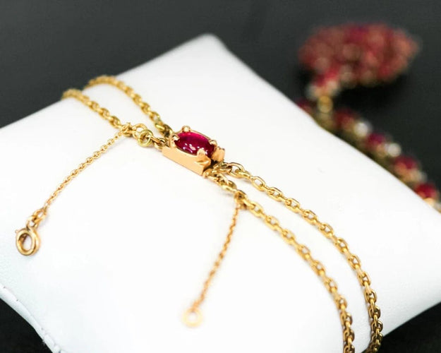 Collier Collier - Cabochons de rubis et diamants en or jaune 750 58 Facettes 240040