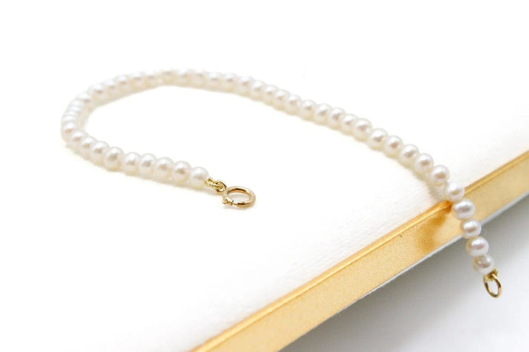 Bracelet Bracelet perles d’eau douce avec fermoir en or jaune 750 58 Facettes 250129