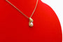 Pendentif Pendentif moderne en or jaune 750 et perles de culture 58 Facettes 240385